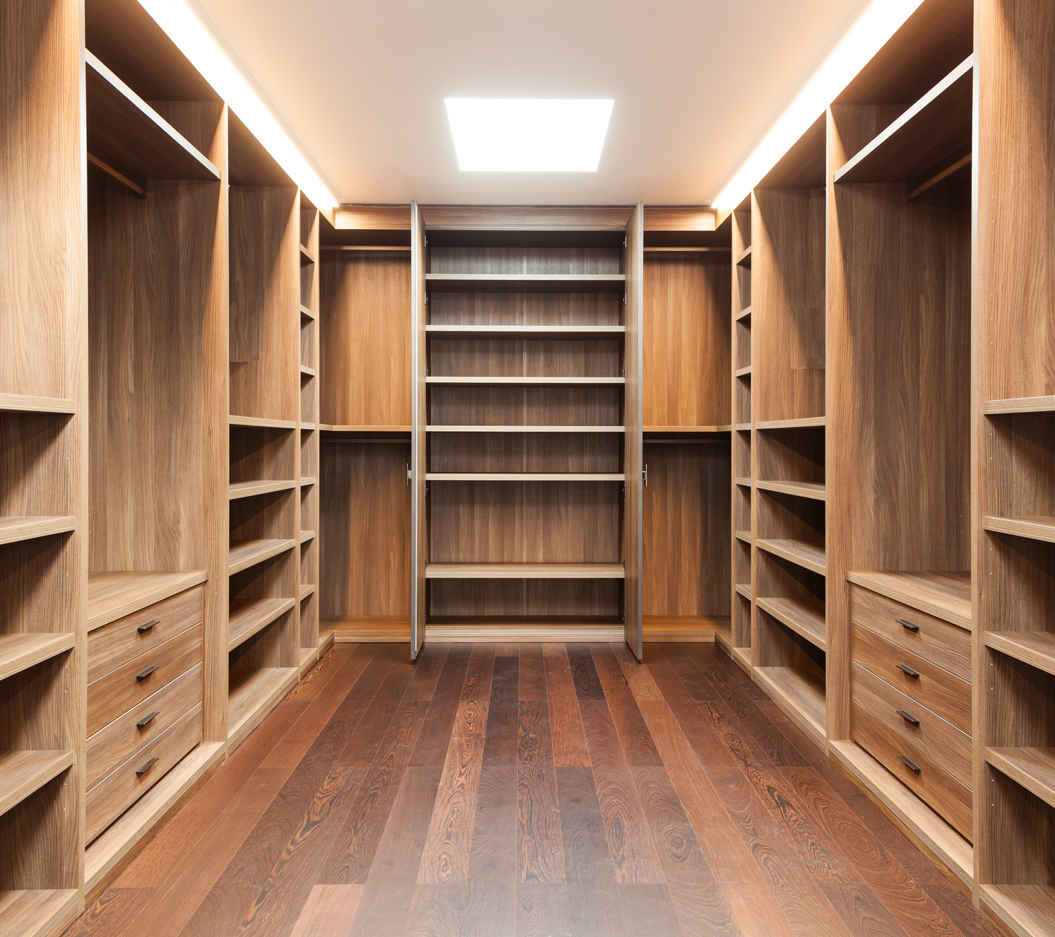 wide wooden dressing room, interior of a modern house